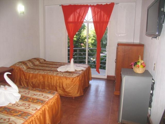 Hotel Y Suites Bugambilias ริงกอน เด กัวยาบิโตส ห้อง รูปภาพ