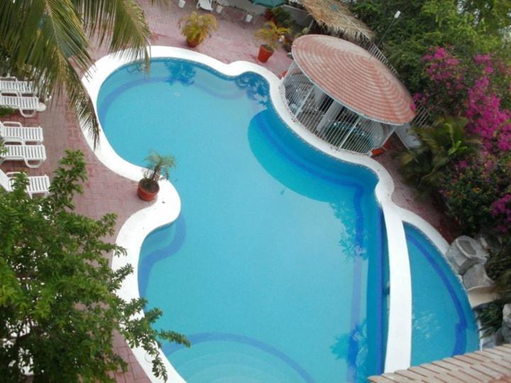 Hotel Y Suites Bugambilias ริงกอน เด กัวยาบิโตส ภายนอก รูปภาพ